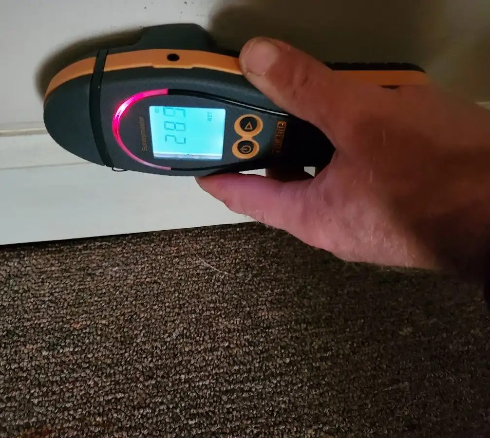 Moisture detection at baseboard during Burst Pipe Cleanup in Fort Irwin